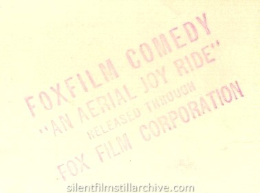 Fox Studios stamp on the back of a Fox comedy still for AN AERIAL JOYRIDE (1917).