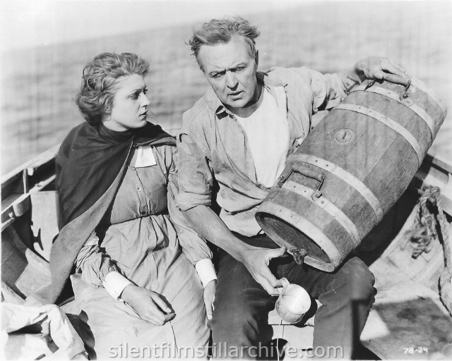 Jane Novak and Hobart Bosworth in a lifeboat from BEHIND THE DOOR (1919)