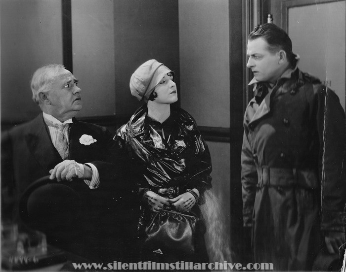 Otis Harlan, Gertrude Olmstead, and Reginald Denny in THE CHEERFUL FRAUD (1926)