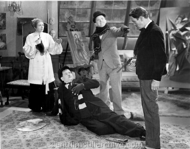 Stan Laurel and Oliver Hardy in THE FIXER UPPERS (1935)
