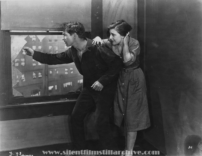 Cullen Landis, and Virginia Brown Faire in FRENZIED FLAMES (1926).