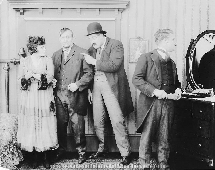 Mary Thurman, Charlie Murray, Wayland Trask, and Erle C. Kenton in FRIEND HUSBAND (1918)