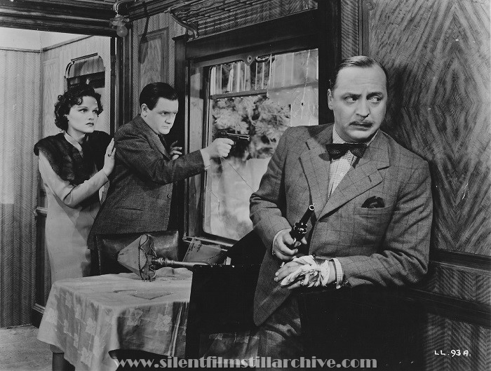 Linden Travers, Naunton Wayne, and Basil Radford in THE LADY VANISHES (1938)
