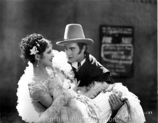 Billie Dove and Gilbert Roland in THE LOVE MART (1927)