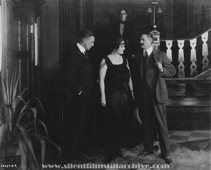 Lee Willard, Ruth Saville (?), and Harry Todd in THE MAN IN HIM (1916)