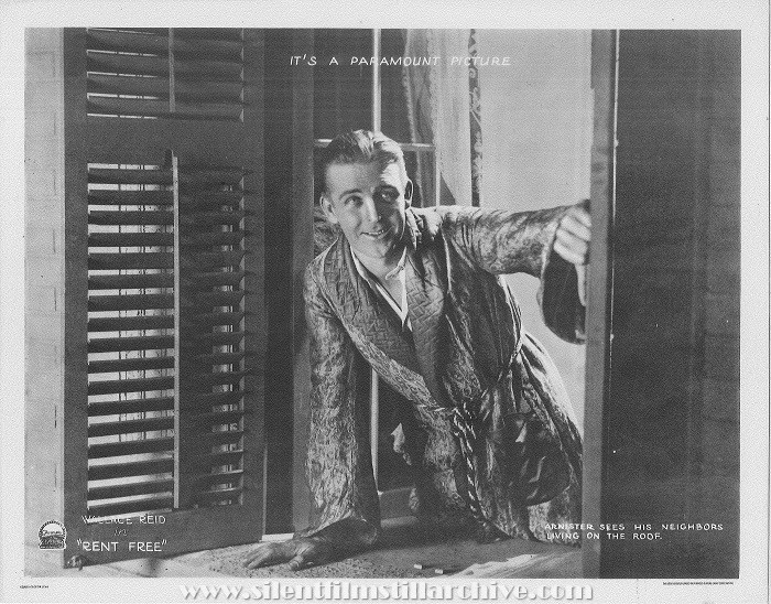 Lobby card for RENT FREE (1922) with Wallace Reid. Arnister sees his neighbors living on the roof.