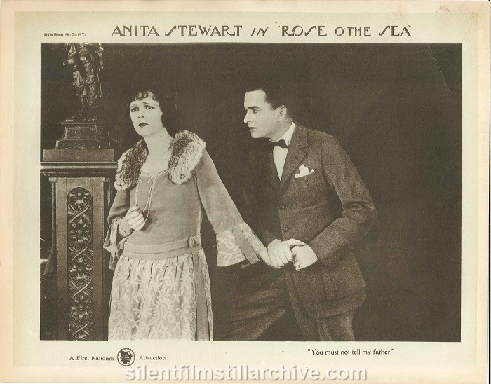 Lobby card with Anita Stewart and Thomas Holding on a lobby card for ROSE O' THE SEA (1922)