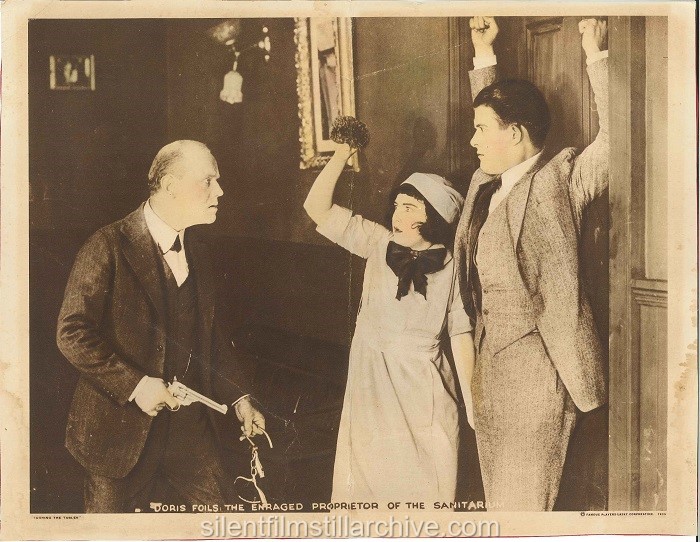 Lobby card for TURNING THE TABLES (1919) with Porter Strong, Dorothy Gish and Raymond Cannon