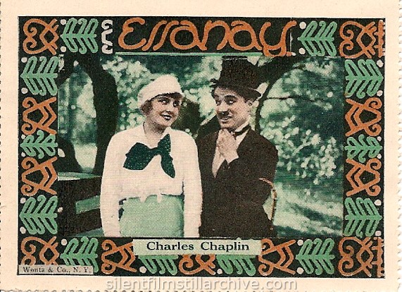 Edna Purviance and Charlie Chaplin in IN THE PARK (1915) collector stamp from Wentz & Co.