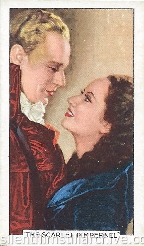 Leslie Howard and Merle Oberon in THE SCARLET PIMPERNEL (1934) Gallaher Ltd. Famous Film Scene card