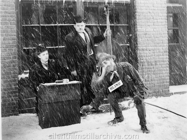 Stan Laurel, Oliver Hardy and Bobby Burns in BELOW ZERO (1930)
