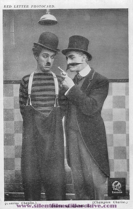 Red Letter Photocard of Charlie Chaplin and Leo White in THE CHAMPION (1915)