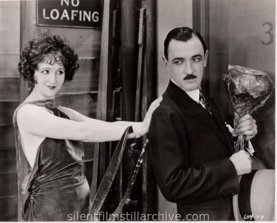 Julia Faye and Raymond Griffith in CHANGING HUSBANDS (1924)