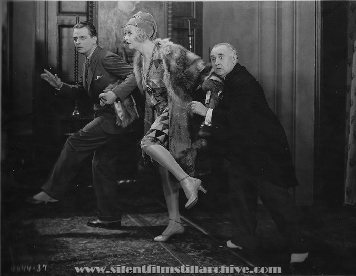 Reginald Denny, Gertrude Astor, and Otis Harlan in THE CHEERFUL FRAUD (1926)