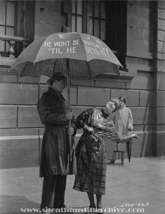 Reginald Denny and Gertrude Olmstead in THE CHEERFUL FRAUD (1926)