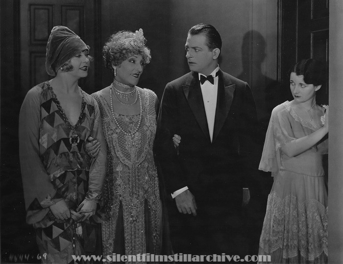 Gertrude Astor, Emily Fitzroy, Reginald Denny and Gertrude Olmstead in THE CHEERFUL FRAUD (1926)