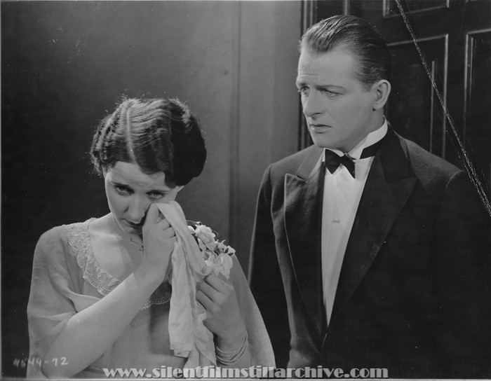 Gertrude Olmstead and Reginald Denny in THE CHEERFUL FRAUD (1926)