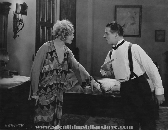 Gertrude Astor and Reginald Denny in THE CHEERFUL FRAUD (1926)