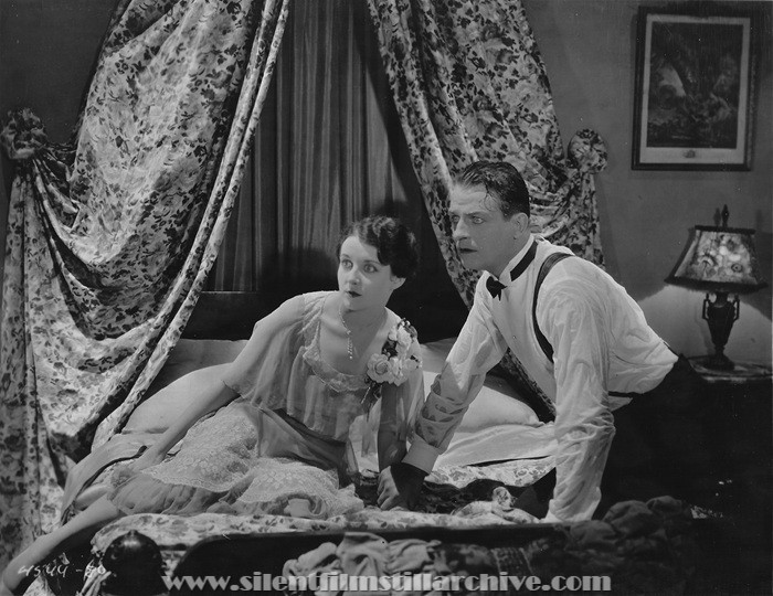 Reginald Denny and Gertrude Olmstead in THE CHEERFUL FRAUD (1926)