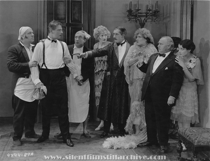 Wilson Benge, Reginald Denny, Luis Alberni, Gertrude Astor, Charles K. Gerrard, Emily Fitzroy, Otis Harlan, and Gertrude Olmstead in THE CHEERFUL FRAUD (1926)