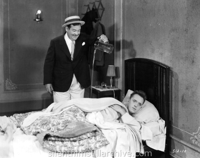 Oliver Hardy and Stan Laurel in EARLY TO BED (1928)
