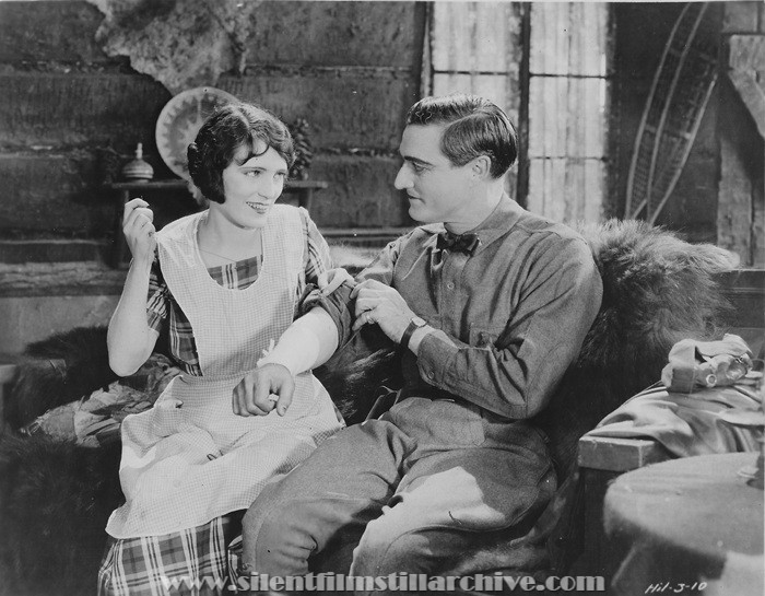 Pauline Starke and Tom Mix in EYES OF THE FOREST (1923)