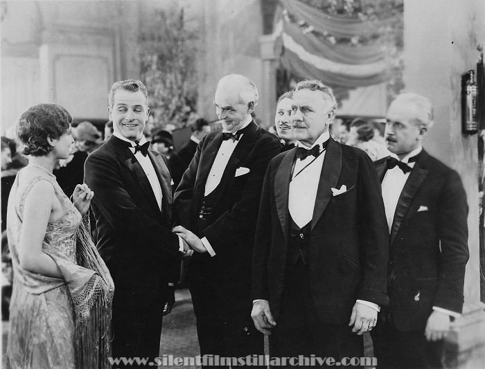 Barbara Worth, Reginald Denny, Claude Gillingwater, and Armand Kaliz in FAST AND FURIOUS (1927)