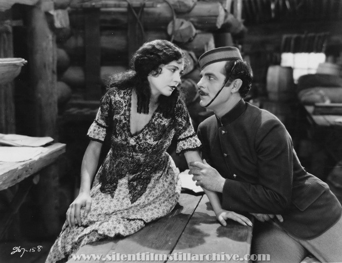Rene Adore and Antonio Moreno in THE FLAMING FOREST (1926)