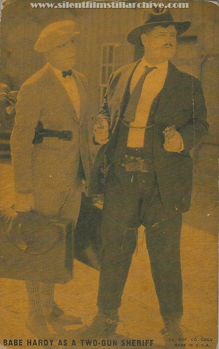 Arcade card for THE GENTLE CYCLONE (1926) with Buck Jones and "Babe" Oliver Hardy
