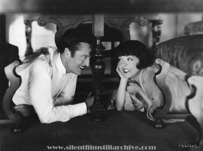 Edmund Lowe and Colleen Moore in HAPPINESS AHEAD (1928)