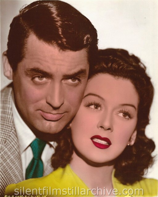 Cary Grant and Rosalind Russell in HIS GIRL FRIDAY (1940). A vintage colorized still.