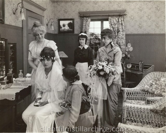 Helen Lindroth and Alice Joyce in IN WOLF'S CLOTHING (1914)