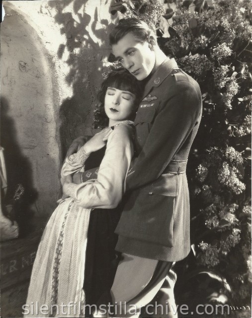 Colleen Moore and Gary Cooper in LILAC TIME (1928)