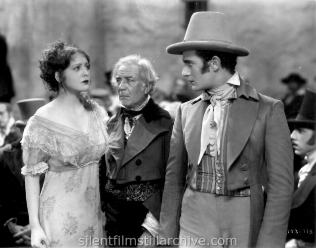 Billie Dove, Emile Chautard and Gilbert Roland in THE LOVE MART (1927)
