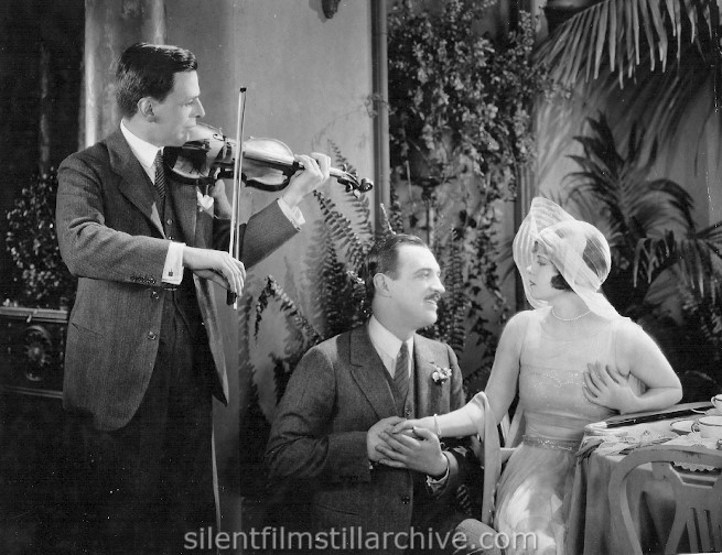 Violinist Albert Spalding, Raymond Griffith and Vera Reynolds in THE NIGHT CLUB (1925)