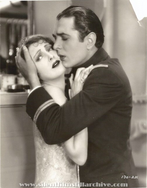 Billie Dove and Donald Reed in THE NIGHT WATCH (1928).