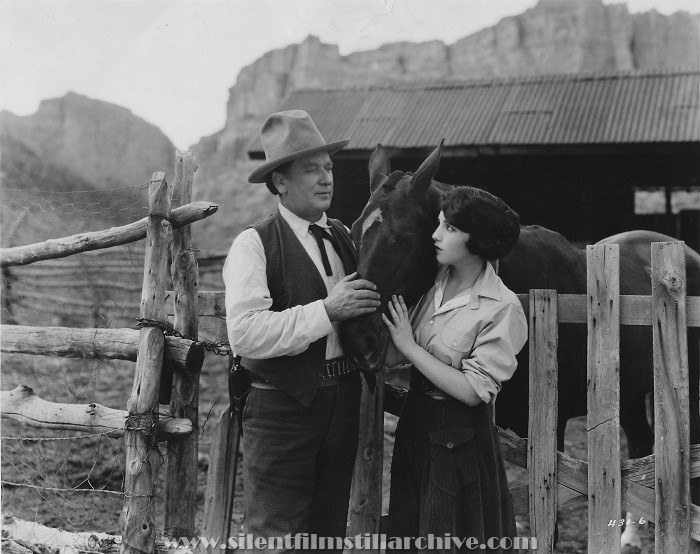 Will Walling and Bebe Daniels in NORTH OF THE RIO GRANDE (1922)
