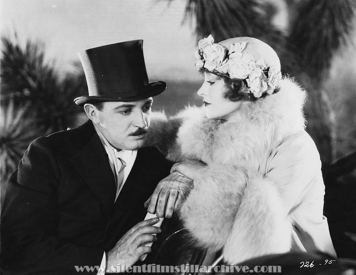 Raymond Griffith and Betty Compson in PATHS TO PARADISE (1926)
