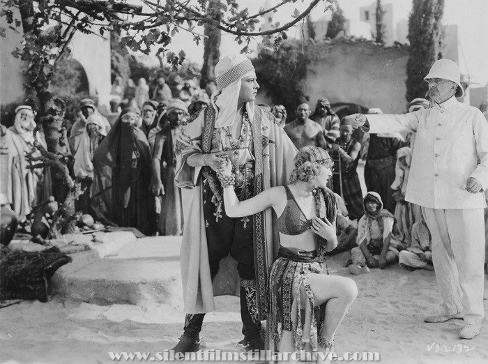 Rudolph Valentino, Vilma Bnky and George Fawcett in THE SON OF THE SHEIK (1926).