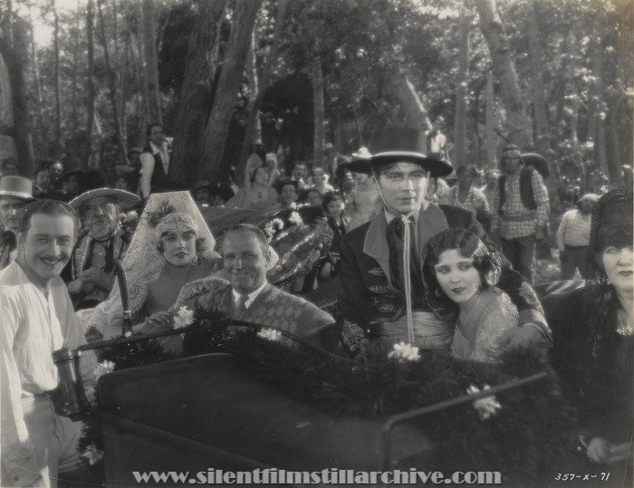 Conrad Nagel, Renée Adorée, director Allen Dwan,
Tom Keene (George Duryea), and Raquel Torres during the filming of TIDE OF EMPIRE (1929)