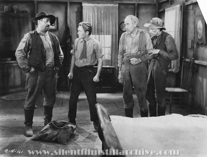Noah Beery, John Cromwell, and John Carridane in TOL'ABLE DAVID (1930)