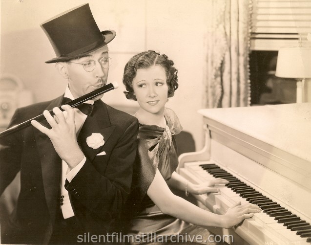 VAMP TILL READY (1936) with Charley Chase on the flute and Wilma Cox at the piano.