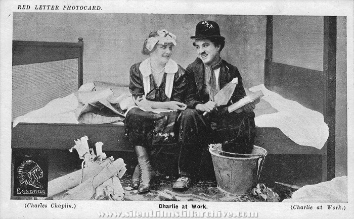 Red Letter Photocard of Edna Purviance and Charlie Chaplin in WORK (1915))